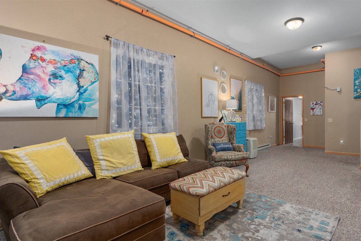 Lounge in the comfortable living room with your family & friends.