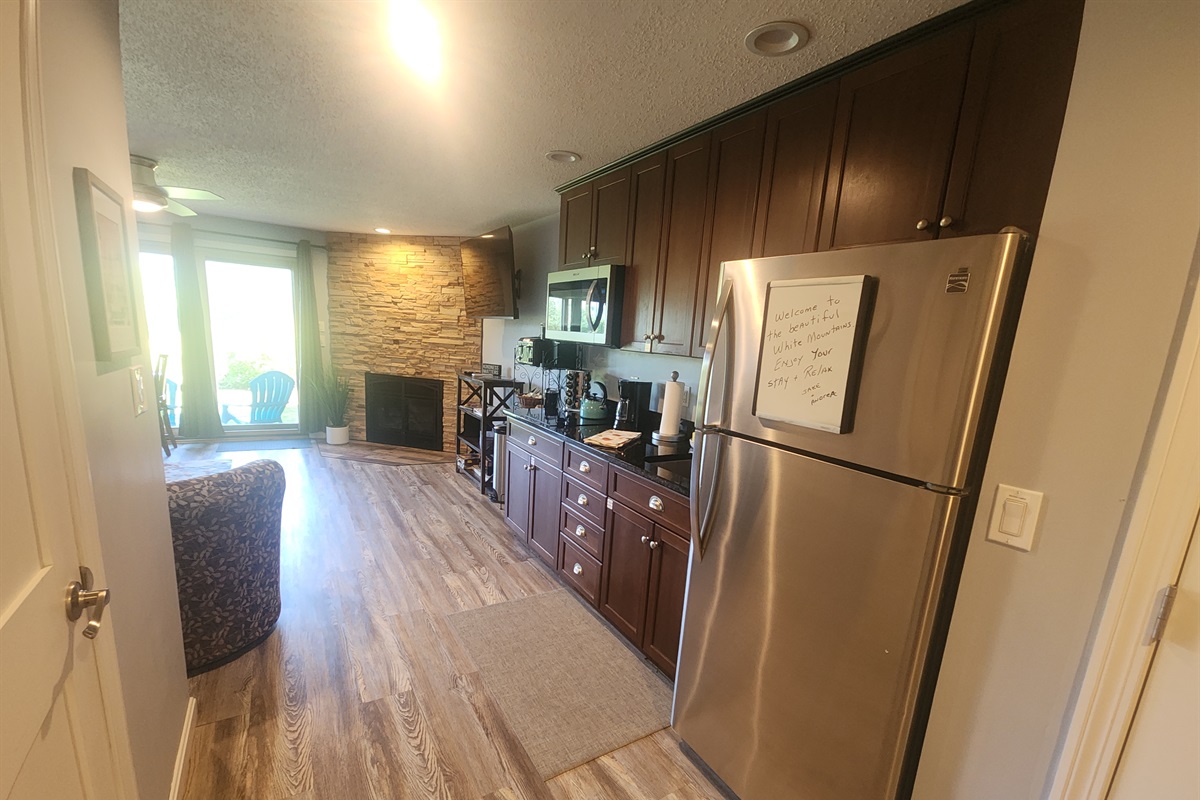 Hallway is open from bedroom to kitchen/living room