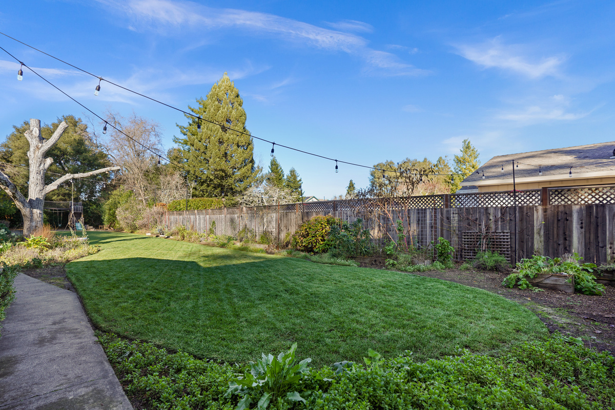 The spacious backyard offers plenty of room to relax, play, and enjoy the outdoors. Whether you're sipping your morning coffee, dining outside, or spending time with family and friends, it's the perfect place to unwind.