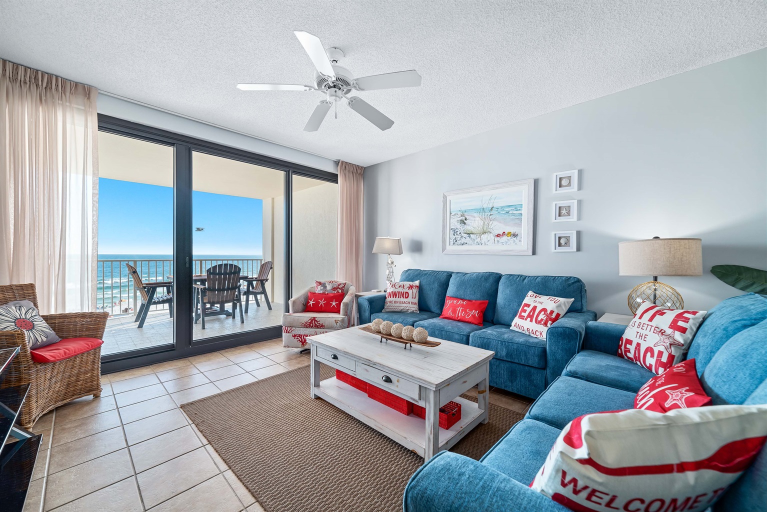 Experience the beauty of indoor-outdoor living with expansive sliding doors leading to a private balcony overlooking the ocean.