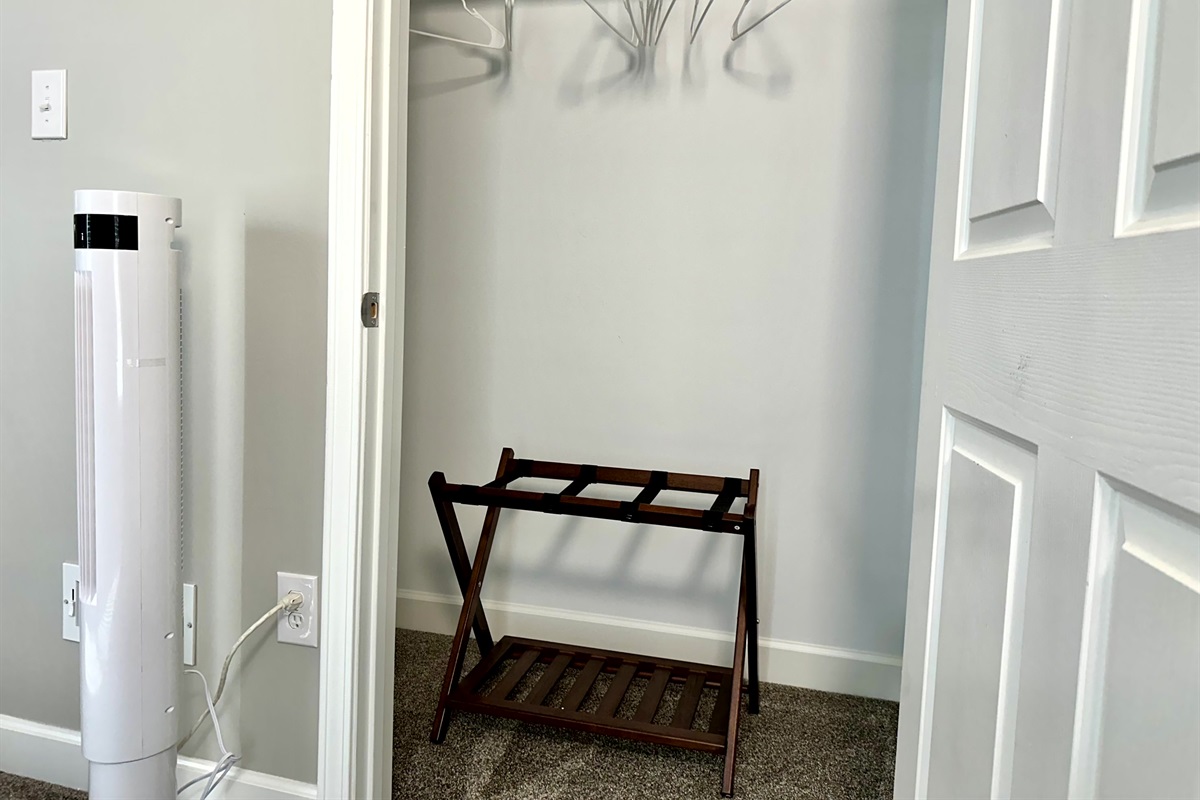 walk-in closet and luggage rack available for both bedrooms