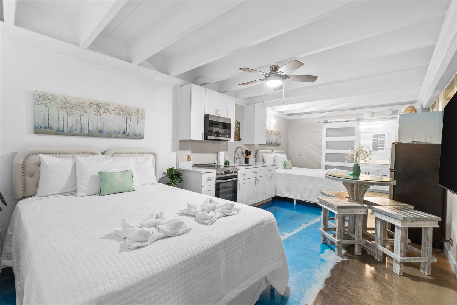 Living Room with Queen Bed and Queen Sleeper Sofa