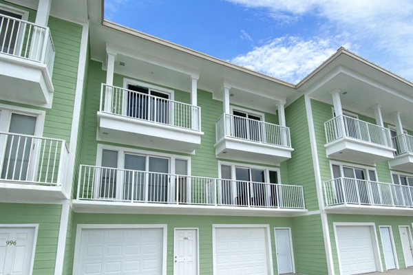 Townhome exterior featuring private garage parking
