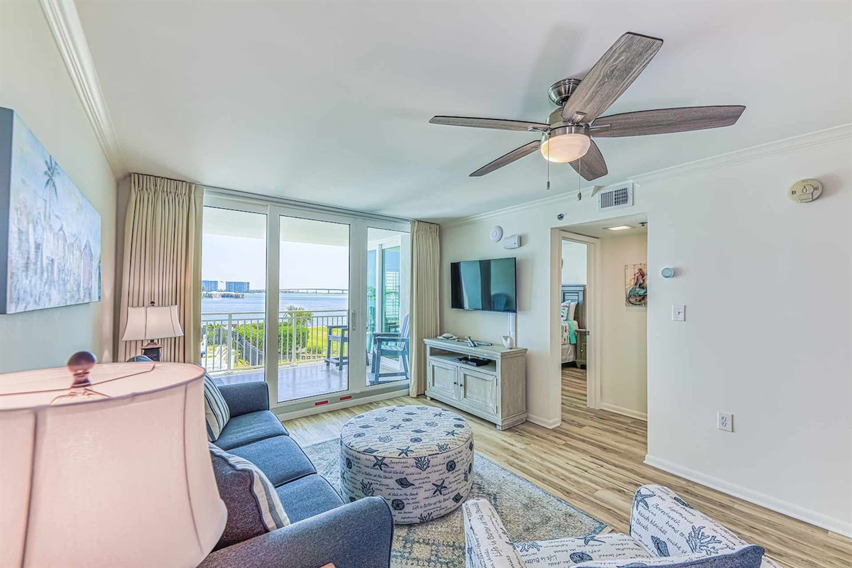 Living Room Retreat: Bright space with stunning views, comfy seating, and coastal decor awaits you!