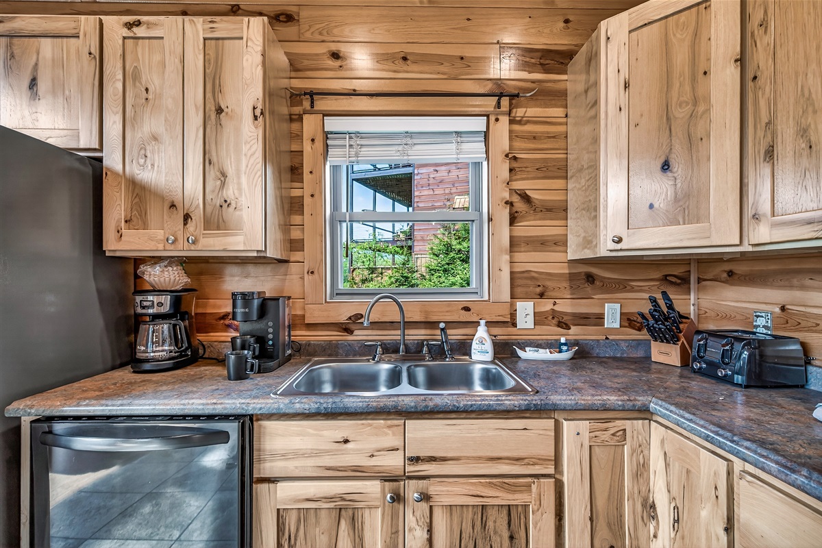 Traditional coffee maker and a keurig in the fully equipped kitchen 