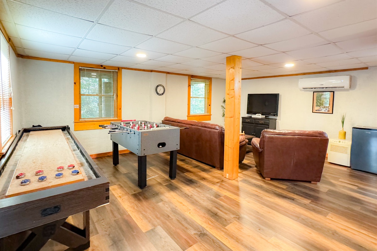 Lower level game room - foosball, shuffle board, table games, cards, Roku TV and more!