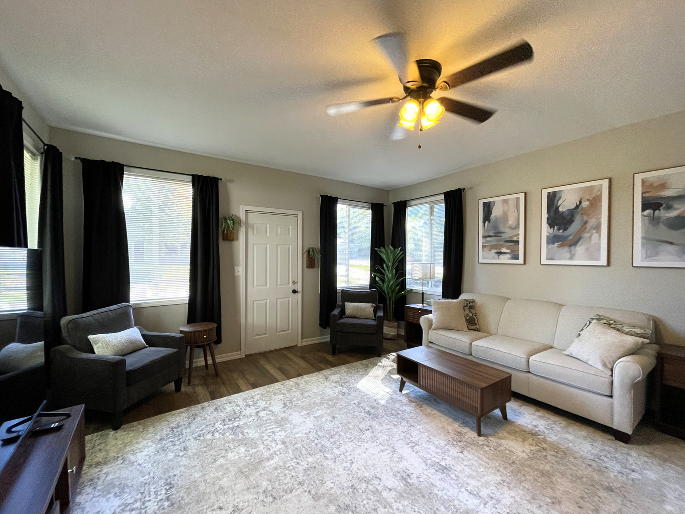 Spacious and Airy Living Room with 75" Smart TV