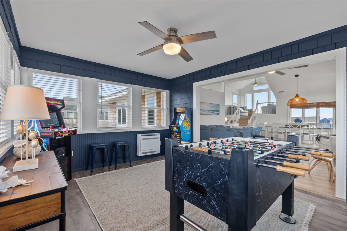 Another view of the game area, open to the rest of the home for easy entertaining.