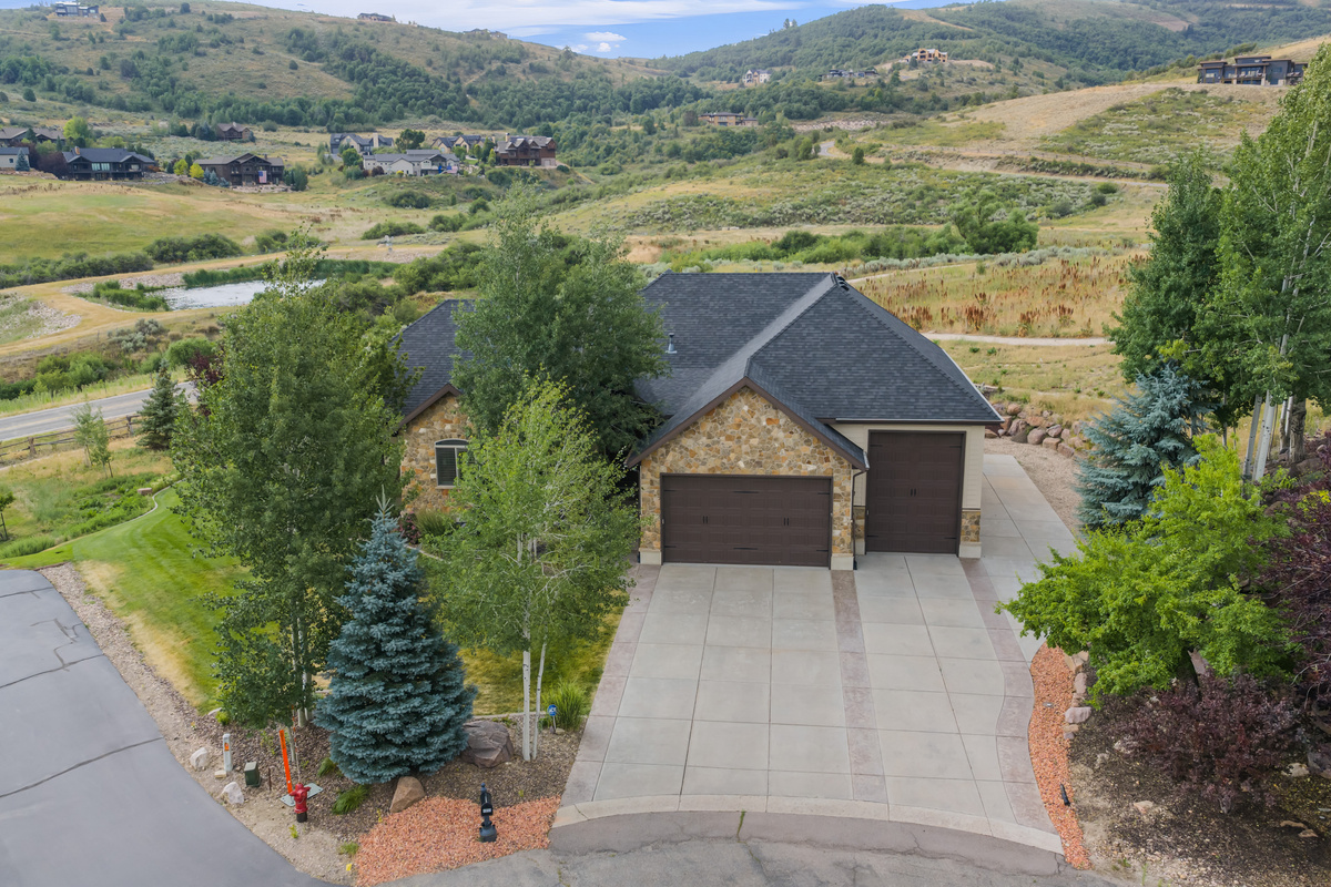 Nestled in the prestigious Chalets at Edgewater community, this beautiful mountain retreat offers easy access to skiing, Pineview Reservoir, hiking, and year-round adventure.