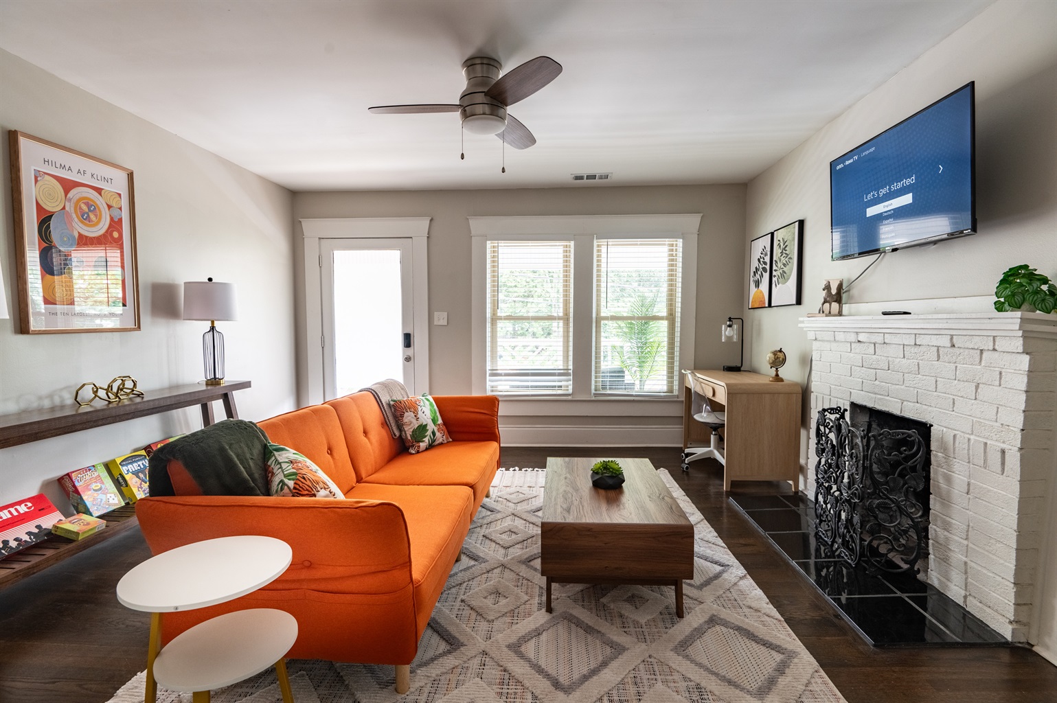 Relax in Comfort: Step into our cozy living room featuring ample seating and a smart TV. Perfect for unwinding after a day of exploring.