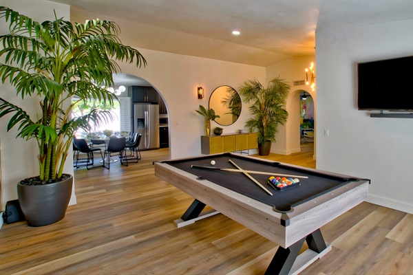Front room with pool table and TV