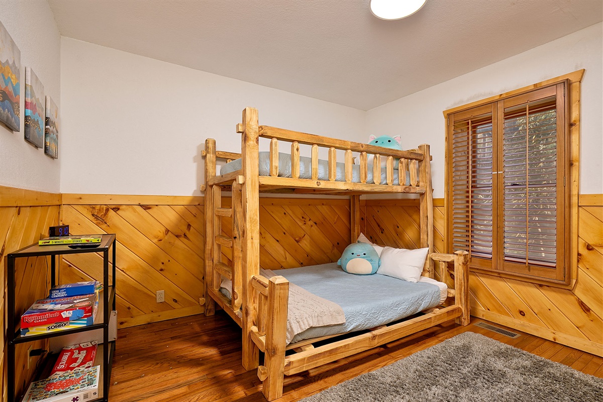 Kids will love their own private space while snoozing on their very own log bunk bed.