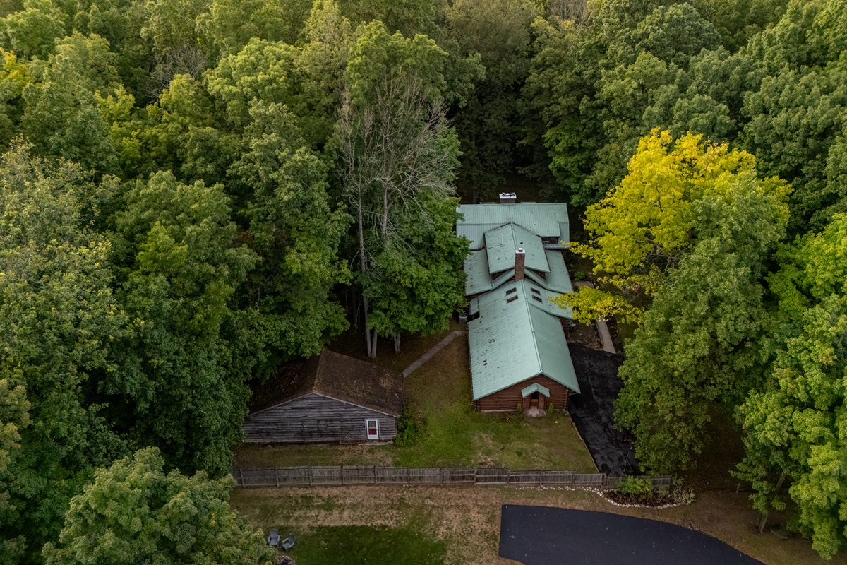 Nestled in a lush forest, this private cabin retreat offers peace, privacy, and a true escape into nature while still being close to the lake.