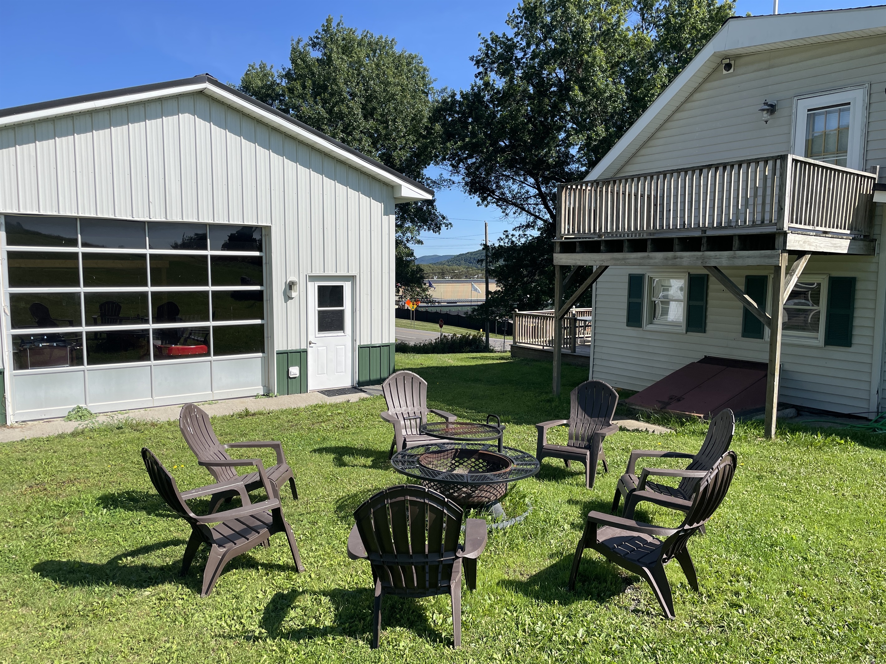 Roundtripper fire pit area, open the game room doors and challenge your group to a shuffle board tournament!