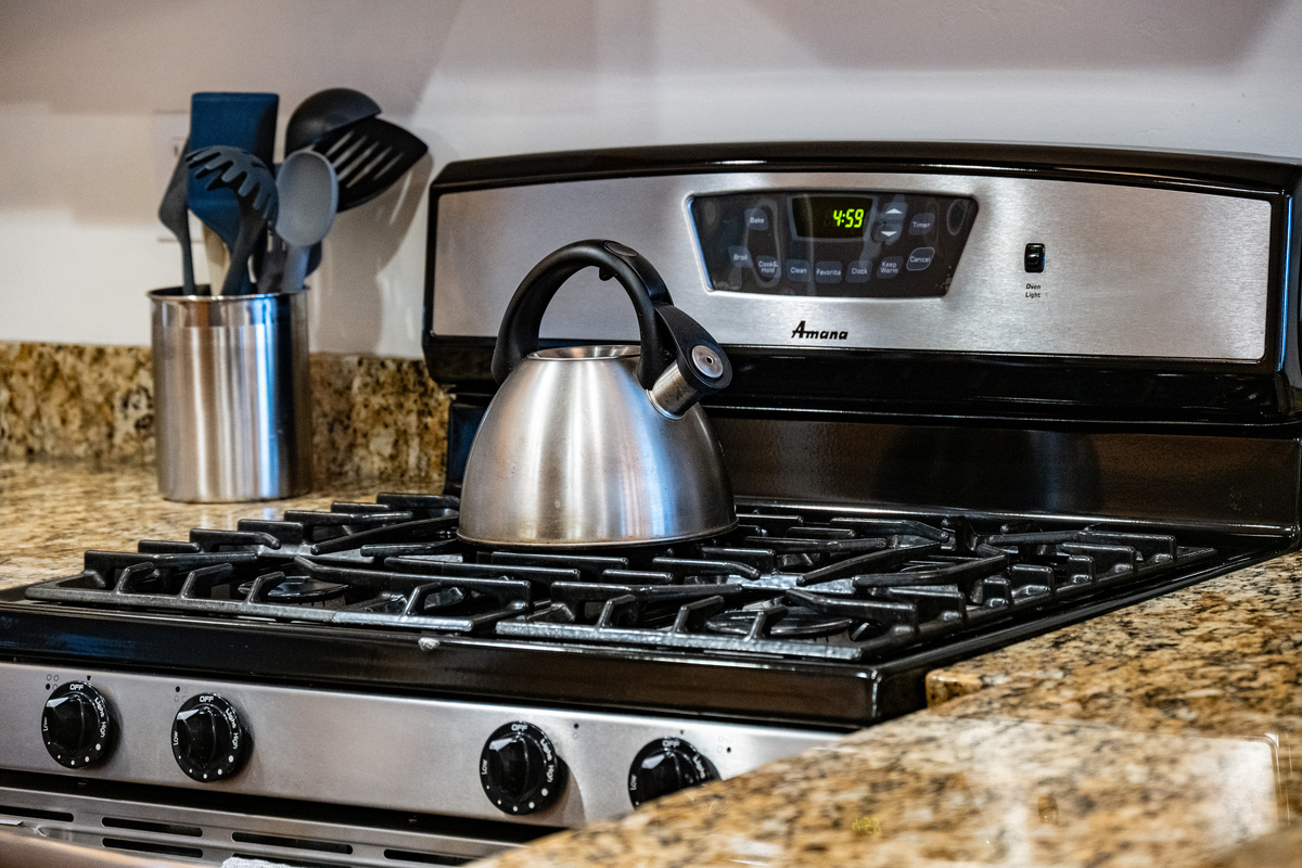 Gas range and well-equipped kitchen make it easy to prepare everything from breakfast to a family dinner.