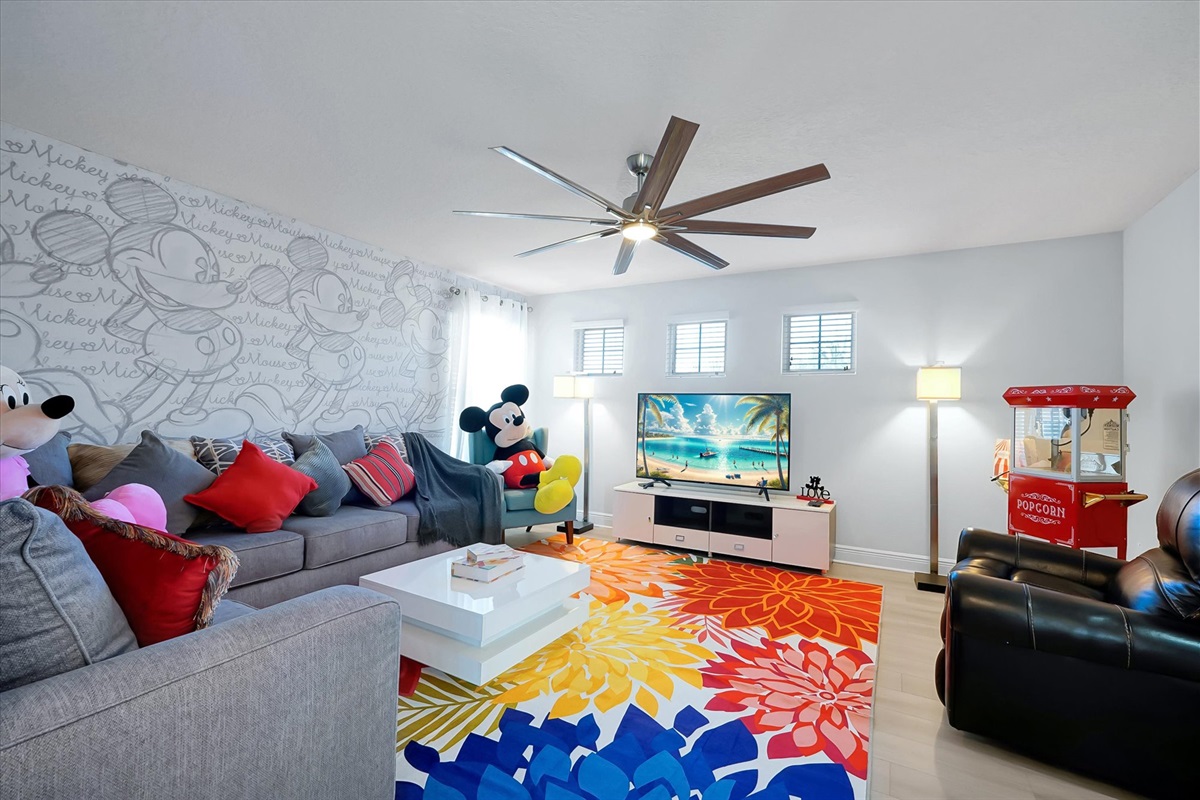 The upstairs living room is a great place for the kids to hang out while the adults are downstairs.