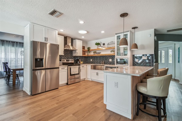 There is seating for four at the countertop in addition to the built-in dinette and dining room.