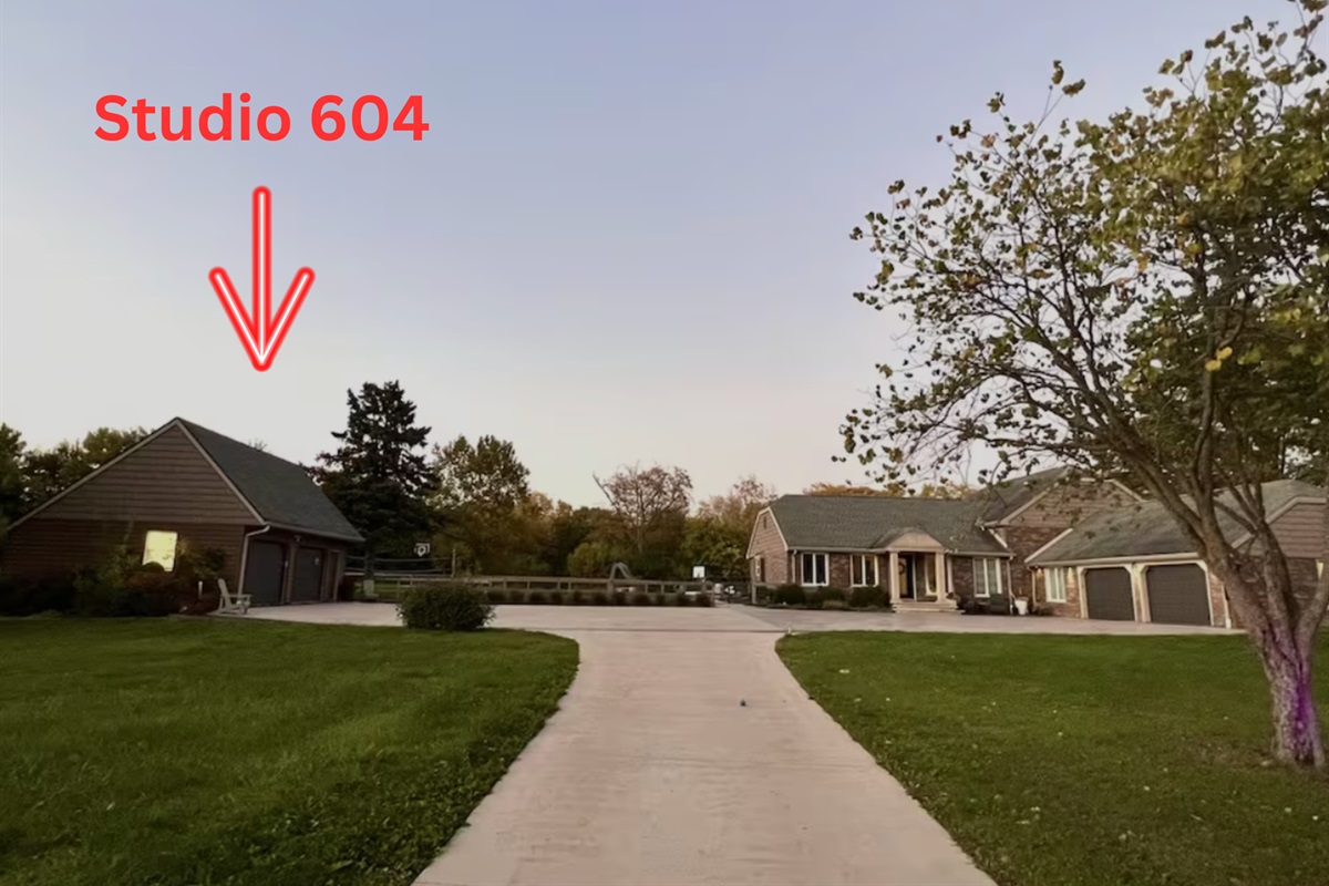 Studio on left, private residence on the right.