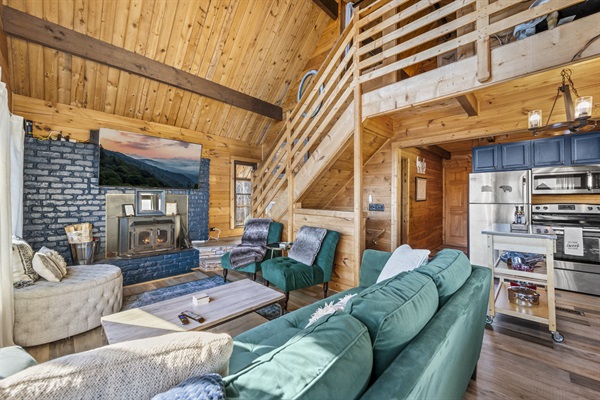 Comfortable plush seating in main living area allows enjoyment of views and entertainment for whole family.  The current green sofa has been replaced with a comfortable leather Crate and Barrel lounging sofa not pictured yet.