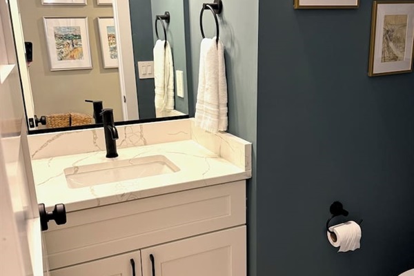 Half bath downstairs by entry