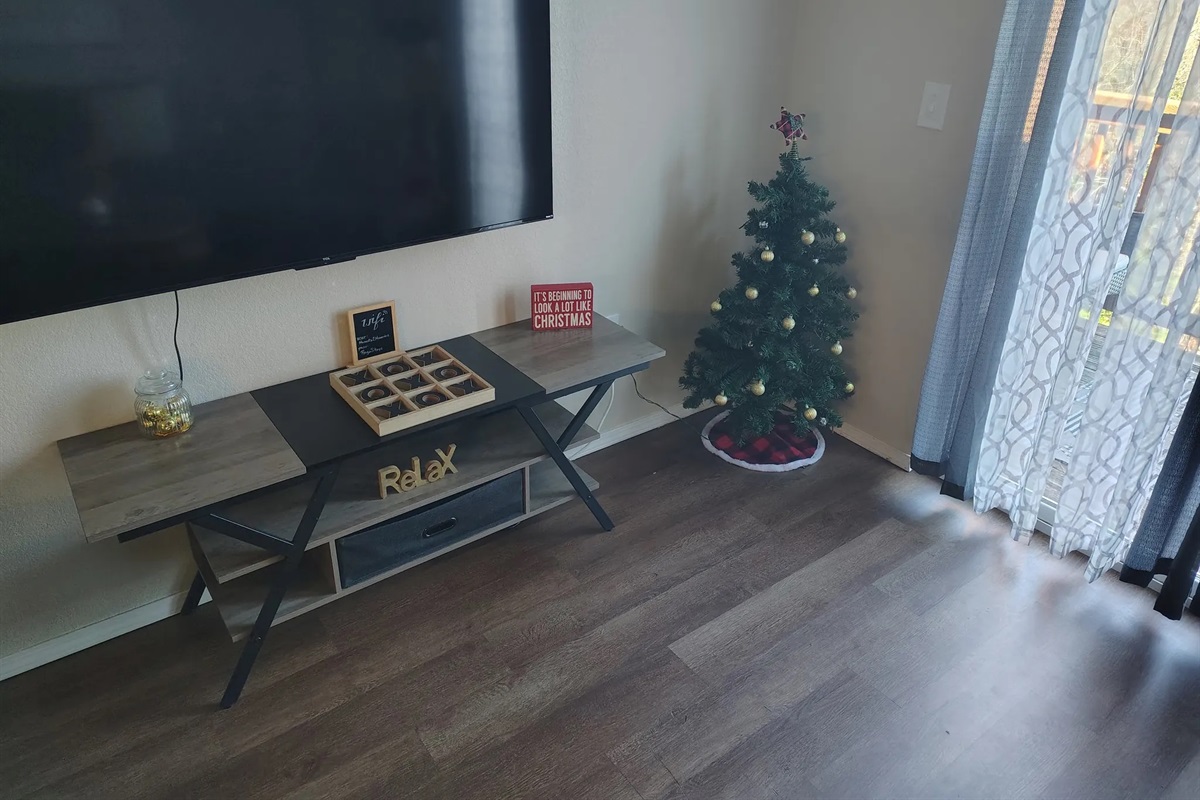 Cuddles by the Christmas tree.