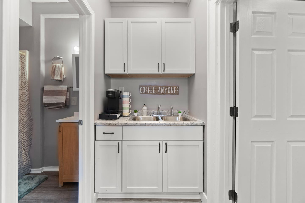 Discover our charming coffee nook, perfect for your morning brew or an afternoon pick-me-up.