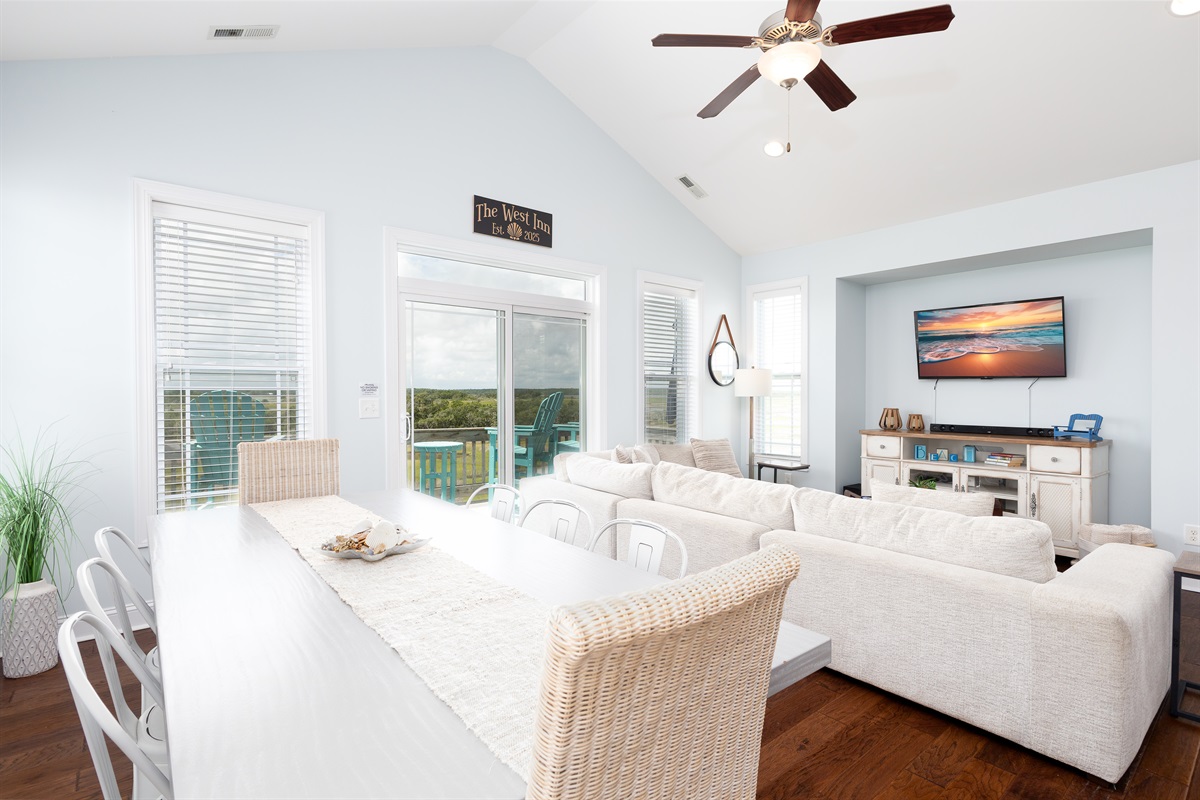 Relax in the living area with plush seating and a smart TV!