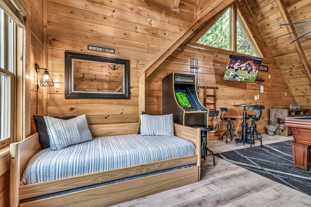 The kids will love sleeping in the loft!  The daybed offers two sleeping spaces (a trundle bed rolls out from underneath the daybed).  Both are twin beds.