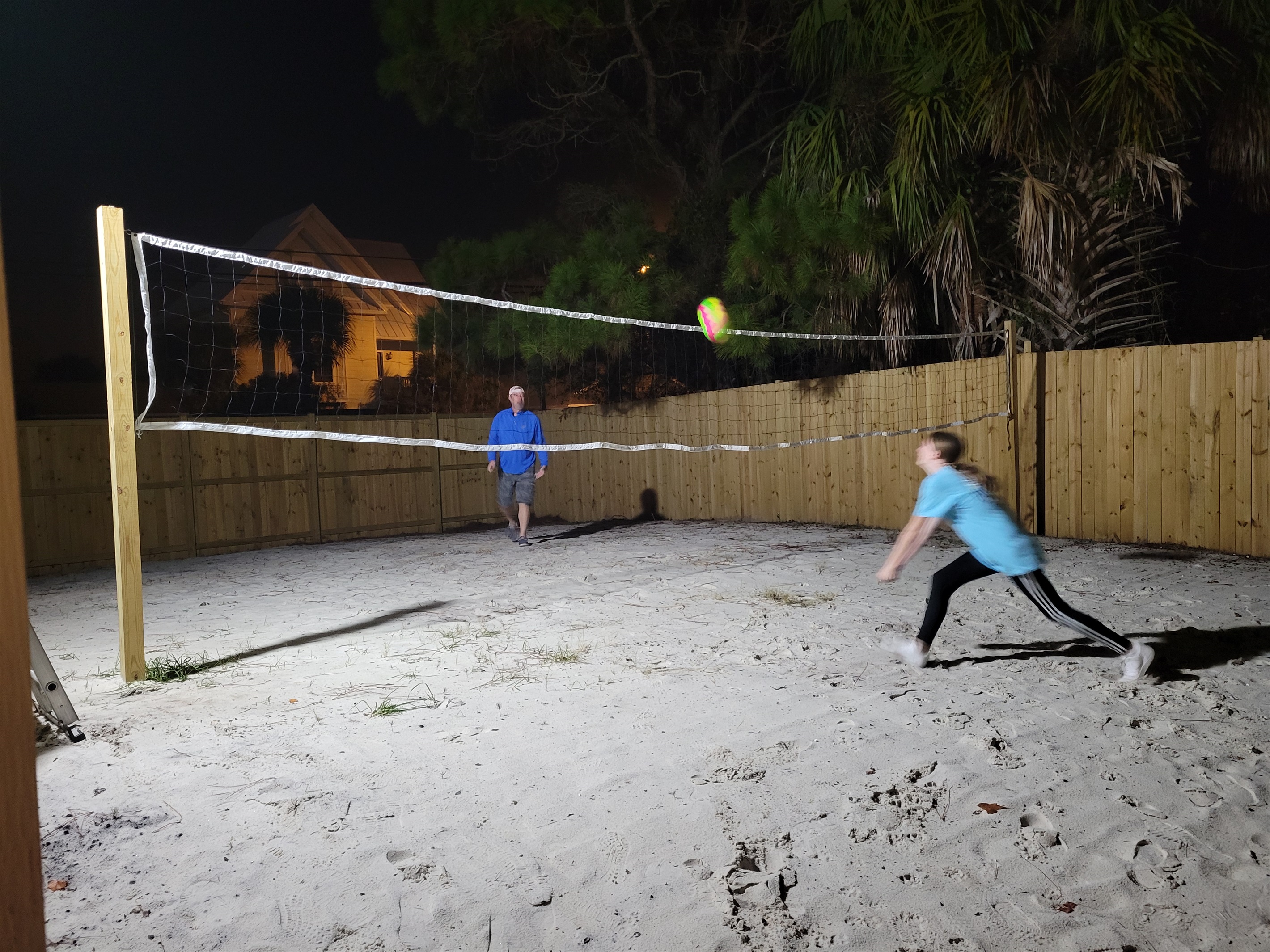 Get ready to take on the night! We've got a spot light shining down on our beach house and volleyball court. #nightgames