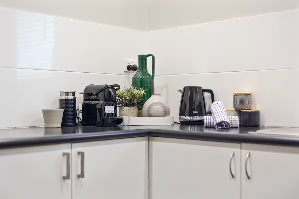The kitchen appliance setup includes everyday cooking and drink-making essentials, giving Sasha’s Cottage on the Hill stronger self-catering convenience.