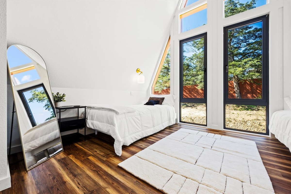 Simple comforts and style meet in this serene sleeping space.