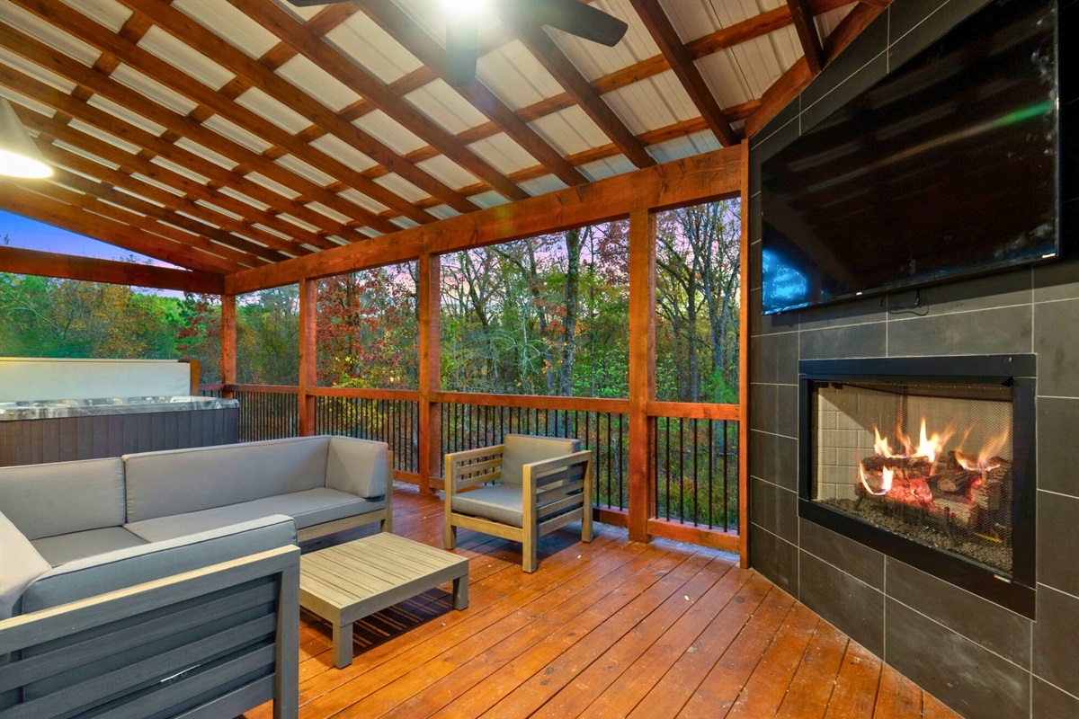 Cozy nights are made for this covered deck—kick back by the fireplace, catch a show on the TV, and end the evening with a soak in the hot tub.