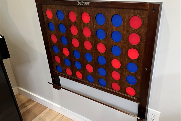 Our game room features a row-matching game, providing hours of interactive fun for guests of all ages.
