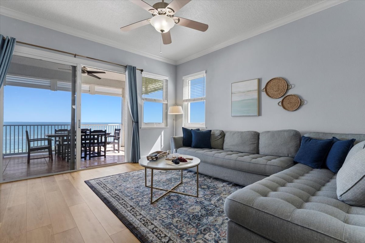Relax in the stylish living room that opens directly to the oceanfront balcony.
