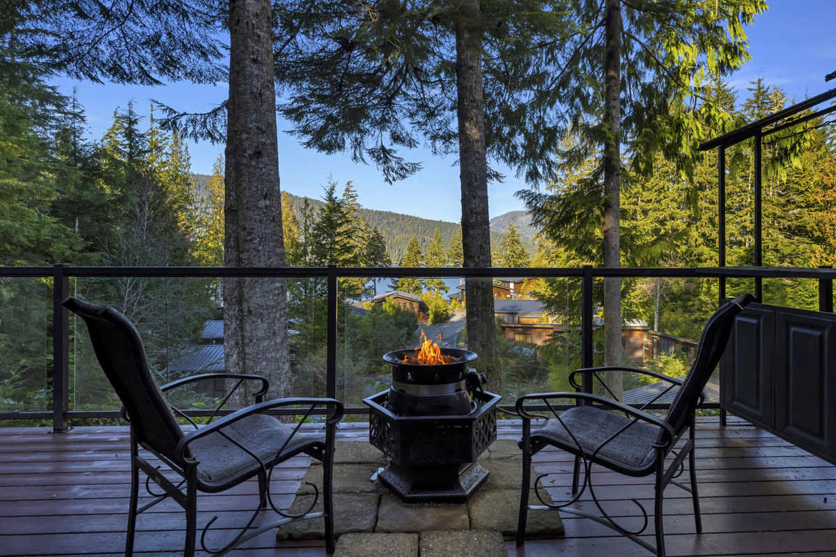 The gas fire pit and view over the Cottage Community and the Bay