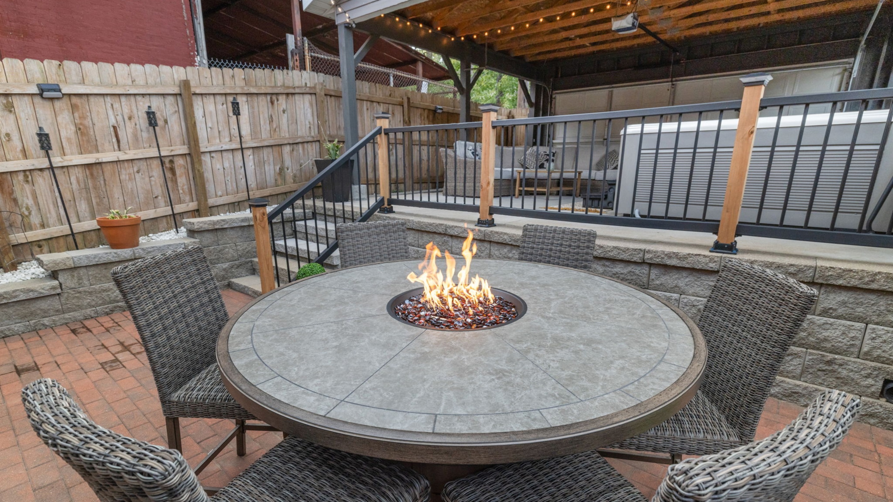 There are plenty of spaces to spread out and enjoy each other's company in the spacious back yard area.