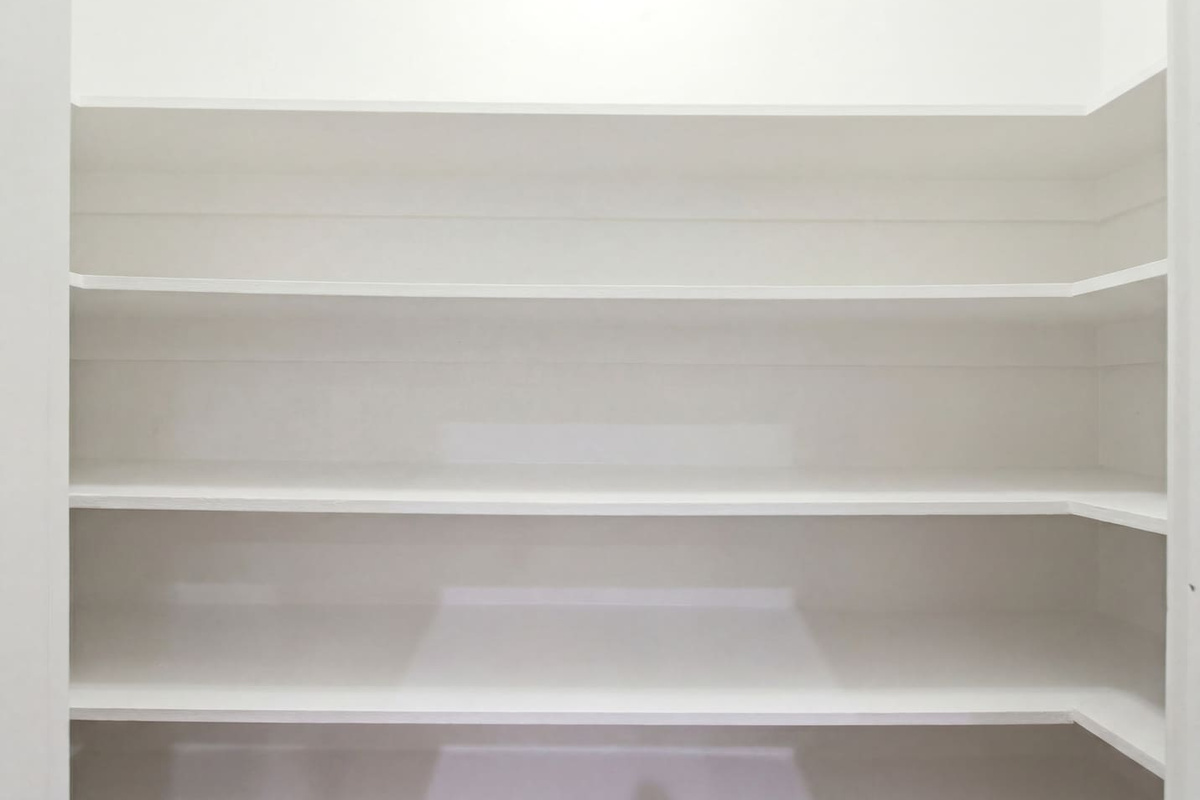Built-in shelving and clean lines throughout the home. Thoughtful storage on every floor makes this townhome ideal for longer stays, work trips, and groups who like to actually unpack.