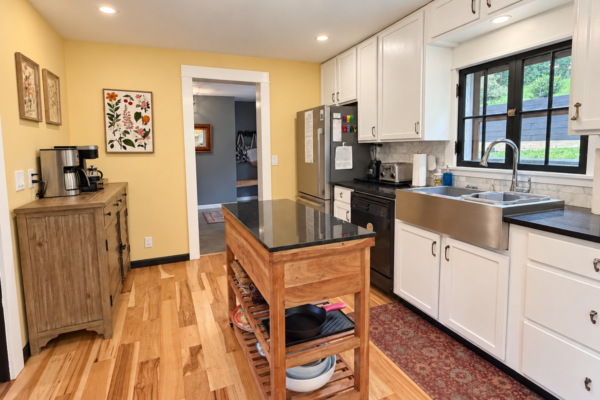 The galley kitchen is fully equipped with high end amenities