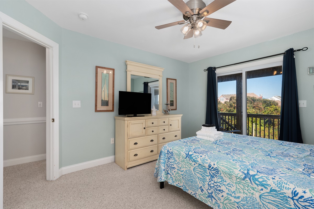 Queen bedroom with TV and access to deck!