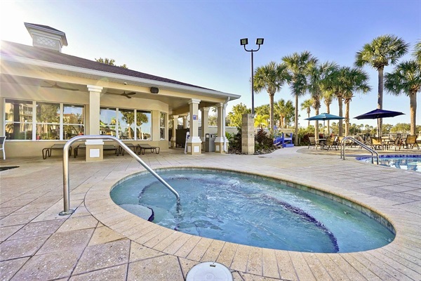 Unwind in Windsor Hills' resort style hot tub and spa – pure relaxation under the Florida sun
