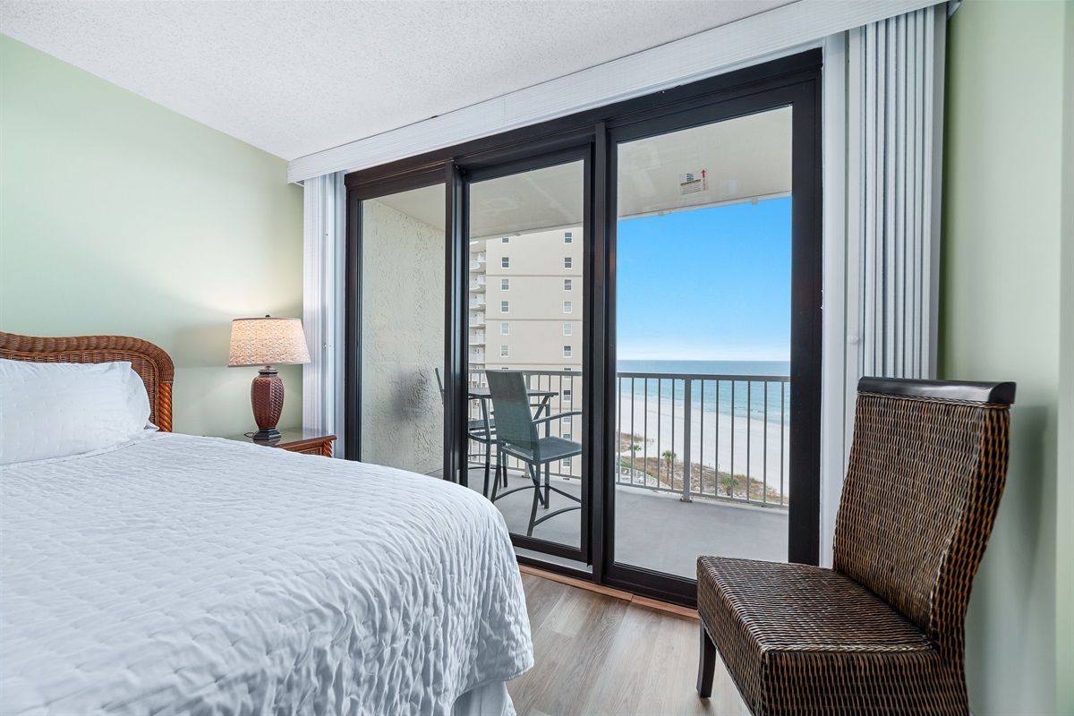 Wake up to stunning Gulf views from this comfortable bedroom with direct balcony access. Perfect for a relaxing vacation.