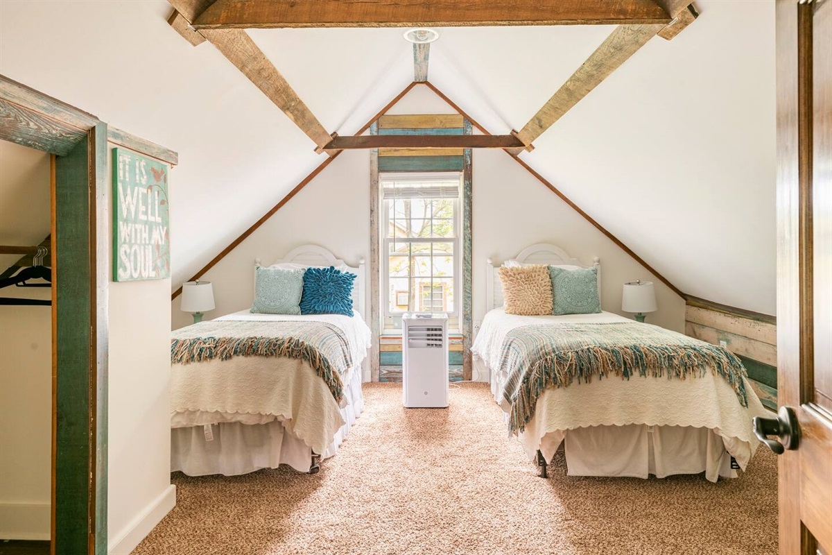 The third bedroom upstairs has two Twin size beds.