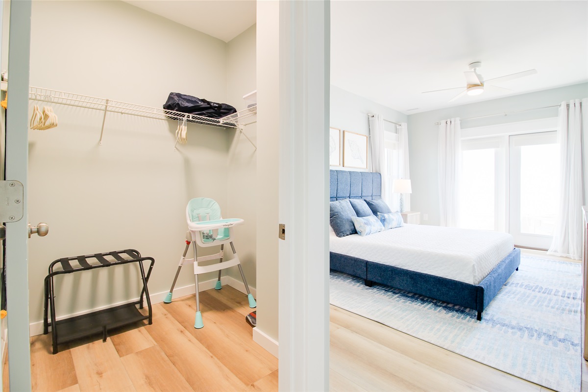 Bedroom 1 - Closet with High Chair and Pack N Play