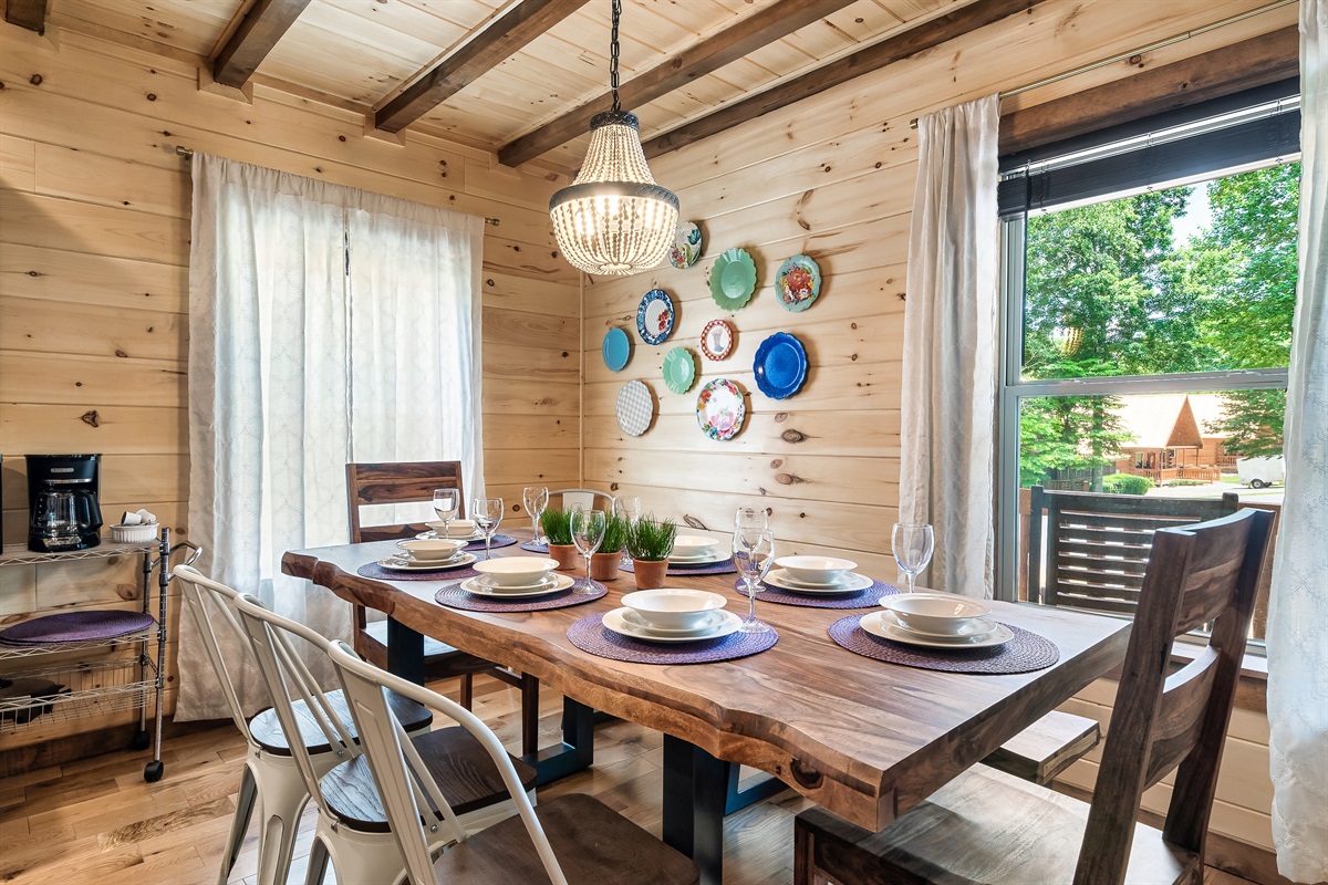 The dining table seats 8 and the island fits 2 more.