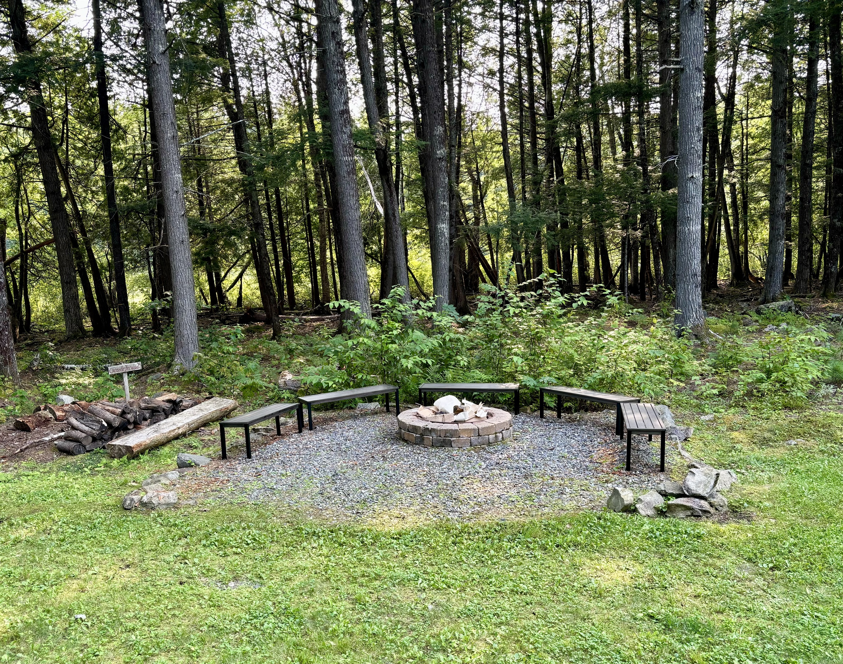 Outside fire pit area. Great place for s'mores and hanging out with family and friends overlooking the lake.