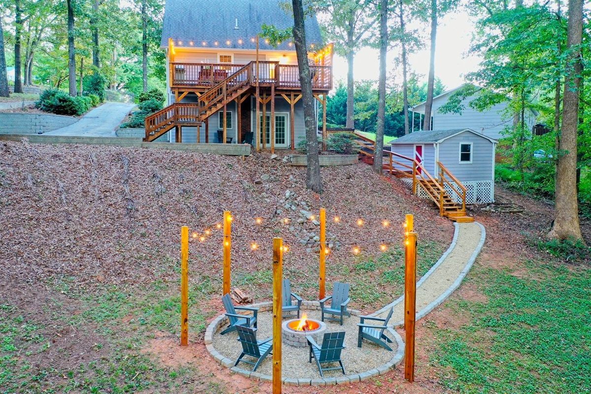 Take a short walk down to the fire pit area, complete with comfortable seating and beautiful lights! 