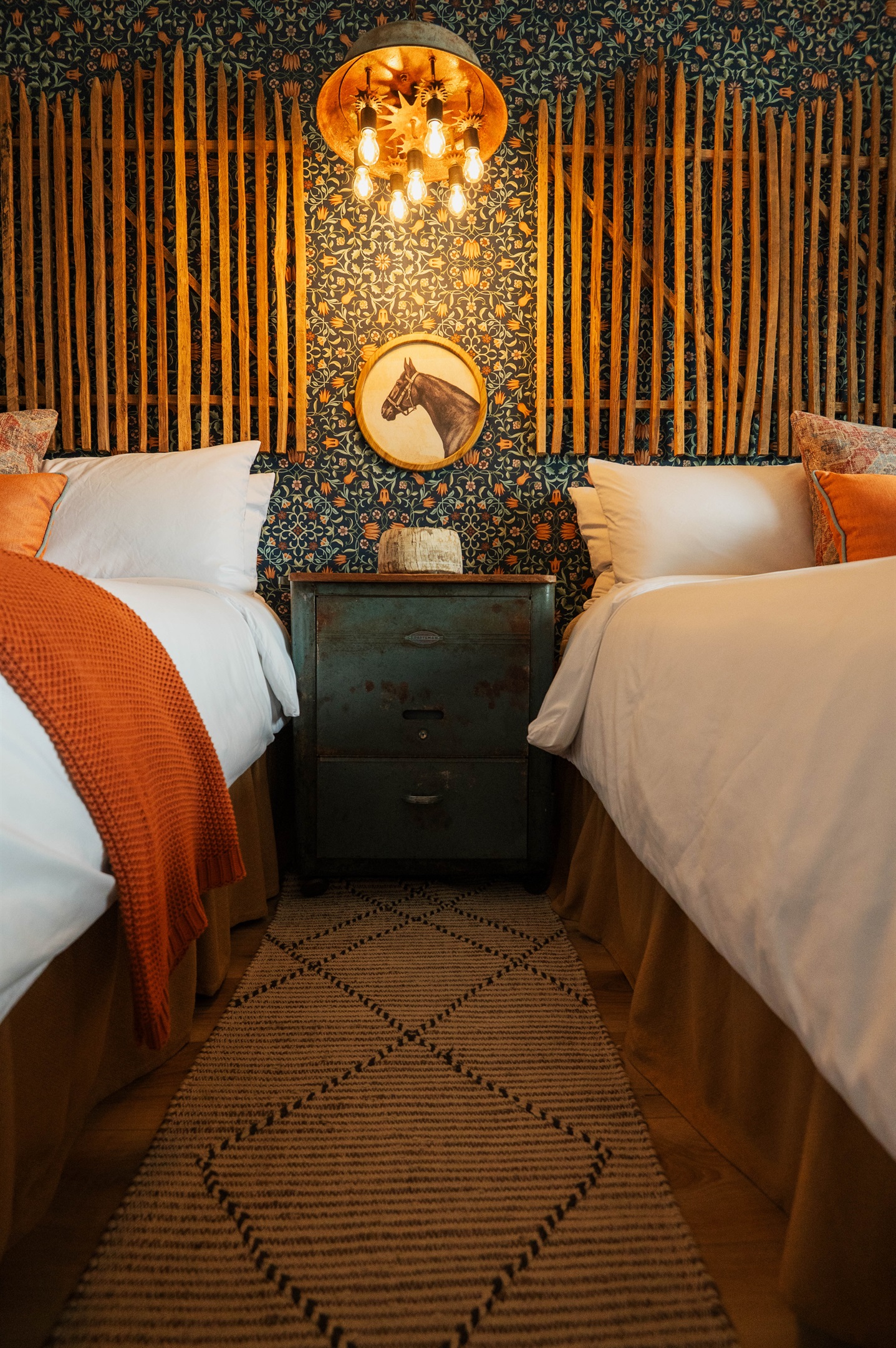 Premium Comphy linens at the Corral Suite — soft layered bedding and modern Western accents, Gaines Ranch on the Square.
