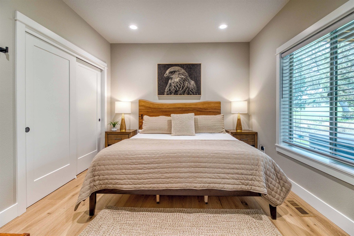 King bedroom #2 curated with luxe bedding & linens and Central OR art. 