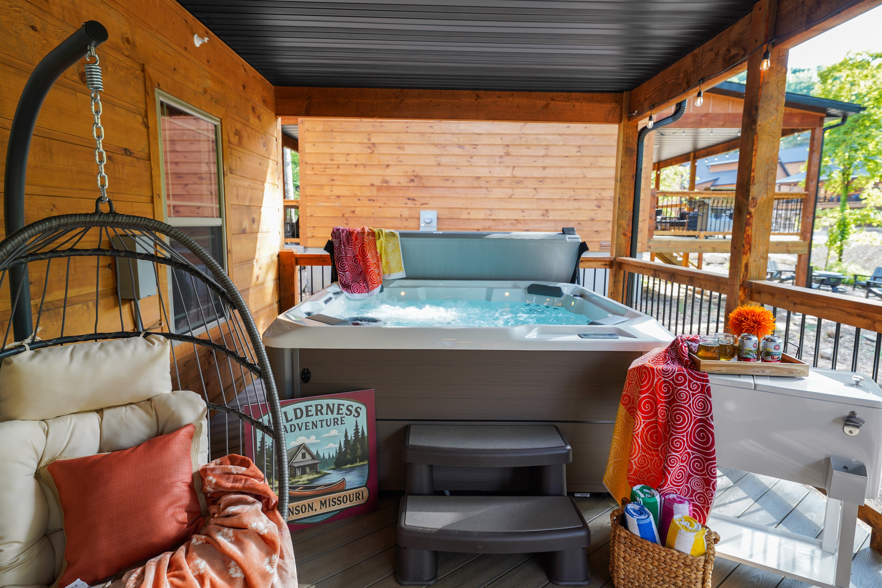 Large hot tub for relaxing on the covered and screened deck