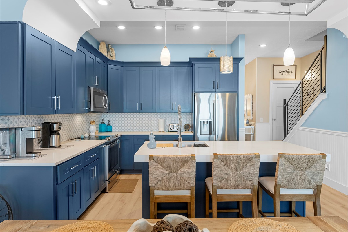 Fully equipped kitchen: granite counters, stainless appliances, plus a wine cooler/ice-maker & kitchenette. Dining room and breakfast bar seat 10 comfortably
